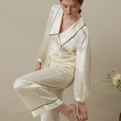 Inspired from the 30’s-40’s chic, this timeless vintage set of suits pants and shirt is a masterpiece of flair. A delicate « Love » french embroidery on the collar was placed to remind you of the great lot of gentleness you are harboring along with your natural elegance. The perfect set to mix & match to transcend the loungewear category.   It is made of 90% Organic Mulberry Silk with low carbon footprint and free of any harmful pollutants & 10% Spandex Pure for a stretch fabric and less wrinkle Silk Short Set, Elegant Pyjamas, Loungewear Brand, Elegant Sleepwear, Chelsea Collar, Silk Loungewear, Pajamas Silk, Basic Dress Pattern, Chic Loungewear