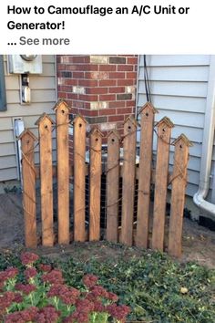 a fence made out of wooden slats in front of a brick wall and flowers