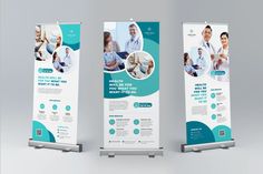 two roll up banners with blue and white designs on them, one is for medical services