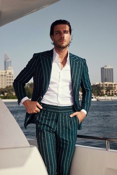 Ditch the boring suit!  Green pinstripe offers sophistication with a personality boost.  Dress it up or down, wear it year-round. Find your perfect green pinstripe suit and get ready to impress! #menswear #greenpinstripe #suitup #style Green Pinstripe Suit, Suit Green, House Floor Design, Suits Men, Party Suits, House Floor, Suit Up, Business Formal