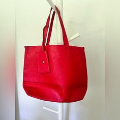 Pre Owned But Nwot Condition This Beautiful Classic Red Leather Tote Is Unlined, Roomy , Lightweight And Functional Super Chic Looking At The Same Time Approx 18” Ht, 13.5” W Pouch Is 3.5” X 5.5” Classic Red Bags With Large Capacity, Classic Red Bag With Large Capacity, Classic Red Large Capacity Bag, Classic Large Capacity Red Bag, Everyday Red Satchel With Double Handle, Classic Red Bags For Daily Use, Everyday Red Double Handle Satchel, Classic Red Bag For Daily Use, Chic Red Satchel With Large Capacity