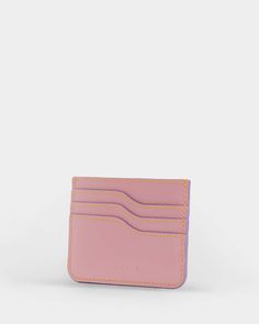 This leather card holder stands out for its compact, elegant lines. The accessory with six card slots and internal pocket is brightened by the iconic MIETIS logo. Elegant Pink Everyday Card Holder, Pink Bifold Card Holder With Interior Slots, Pink Card Holder With Card Slots For Daily Use, Compact Pink Card Holder With Card Slots, Pink Leather Card Holder With Card Slots, Card Holder Leather, Card Slots, Fashion Forward, Card Holder