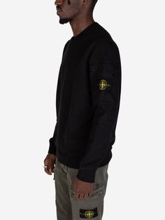 Elevate your everyday look with the epitome of casual cool: the Stone Island Black cotton crewneck sweater. This wardrobe essential is crafted from premium black cotton, offering a luxurious feel that elevates your style. The clean, minimalist design with subtle branding ensures it never goes out of fashion.
  100% Cotton
 Patches on the sleeves
 Pocket with flap
 Press buttons
 Logo badge on the left sleeve
 Ribbed finishes
 Black
 Made in EU
  


Size & Fit:
Il modello è alto 185 cm e indossa Stone Island Sweatshirt, Black Crewneck Sweatshirt, Badge Logo, Black Crewneck, Boot Pumps, Design Minimalista, Stone Island, Sweater Coats, Everyday Look