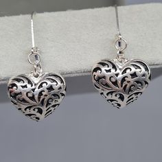 Vintage puff heart earrings. Silver-tone metal with black enamel pierced earrings. Dangle earrings for Valentine's day. Earrings size: 4x2 cm/1.5x0.8 inches. Mark: unsigned. Condition: perfect vintage. Maybe you want to see other earrings too: https://www.etsy.com/shop/VintageVoyageLT?ref=seller-platform-mcnav&section_id=32054783 You can write me a message if you have any questions. Glad you visited my store! Have a great time! Cheap Vintage Dangle Heart Earrings, Black Metal Earrings With Heart Charm, Black Dangle Heart Pierced Earrings, Black Metal Earrings For Valentine's Day, Pierced Metal Earrings Open Heart Shape, Black Heart Drop Earrings, Black Valentine's Day Earrings, Black Metal Heart Charm Earrings, Metal Heart Drop Earrings Pierced