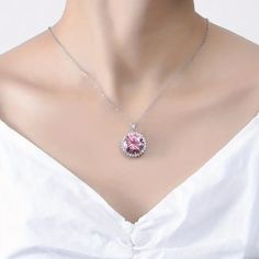 Item Description: *** Plated: Silver Plated *** Main Mterial: Copper *** Mosaic Material: Pink Cz *** Theme: Holiday *** Color: Pink & Silver ** Elegant Design: Sparkling Pink Cz Pendant Adds A Touch Of Sophistication To Any Outfit ** Versatile: Perfect For Both Casual And Formal Occasions ** High-Quality Material: Made With Durable And Long-Lasting Materials ** Great Gift Ldea: Ideal For Birthdays, Anniversaries, And Other Special Occasions ** Easy To Wear: Comes With A Comfortable And Adjustab Silver Party Jewelry With Birthstone, Silver Birthstone Jewelry For Party, Party Jewelry With Birthstone, Party Gemstone Round Pendant Jewelry, Party Gemstone Jewelry With Round Pendant, Round Pendant Gemstone Party Jewelry, Silver Round Necklace For Party, Party Jewelry With Birthstone In Cubic Zirconia, Cubic Zirconia Birthstone Jewelry For Party