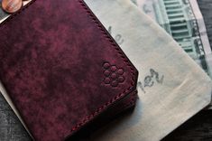 We have the perfect wallet for stylish and modern men and women! Our minimalist burgundy leather wallet combines elegant design and functionality.  PRODUCT FEATURES  The accessory does not take up much space and fits in your pocket. The model is suitable for both men, women and children. The product is made of Italian buttero leather from the Walpier factory. It is one of the oldest tanneries in Italy, producing quality vegetable tanned leather. The factory is located in the historic area of Tus Burgundy Wallet With Interior Card Slots, Luxury Burgundy Wallet For Everyday Use, Burgundy Rectangular Wallet With Interior Card Slots, Travel Wallets With Interior Card Slots In Burgundy, Travel Wallet With Interior Card Slots In Burgundy, Burgundy Wallets With Card Slots For Daily Use, Burgundy Wallet With Card Slots For Daily Use, Burgundy Leather Wallet For Everyday Use, Burgundy Bifold Wallets With Card Slots