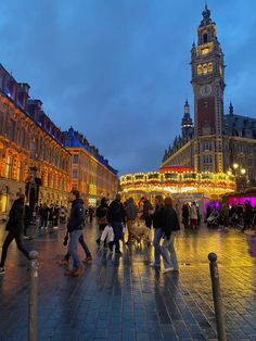 many people are walking around in the city