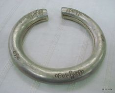 "VINTAGE ANTIQUE TRIBAL OLD SILVER BRACELET BANGLE SET 2pc FROM RAJASTHAN INDIA, NICE DESIGN EASY TO WEAR BY LITTLE TWIEST, GOOD FOR JEWELRY COLLECTION. Note - set is much worn & dent check pictures carefully for more detail. weight for set - 144 grams Inner diameter side to side - 6.5 cm(2.55\") Ineer circumference without open part - 17.8 cm(7\") width - 1.2 cm material - Silver and original old worn set." Traditional Silver Bangle For Rituals, Silver Antique Finish Bangle As Gift, Vintage Oxidized Bangle For Weddings, Silver Bangle With Antique Finish As Gift, Traditional Heavy Antique Silver Bangle, Antique Silver Bangle For Festivals, Vintage Silver Bangle For Ceremonial Occasions, Traditional Stamped Bracelets, Unique Silver Bangle For Rituals