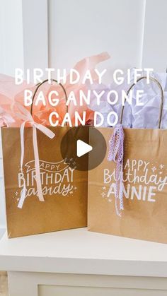 two brown bags with white writing on them and the words happy birthday gift bag anyone can do