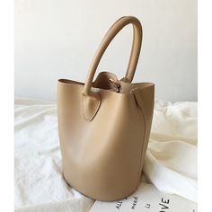 Trendy Office Bucket Bag, Trendy Bucket Satchel For Office, Office Bucket Bag With Removable Pouch, Modern Solid Color Bucket Shoulder Bag, Handheld Bucket Bag With Removable Pouch For Office, Large Capacity Handheld Bucket Bag For Shopping, Handheld Large Capacity Bucket Bag For Shopping, Trendy Handheld Beige Bucket Bag, Trendy Beige Handheld Bucket Bag