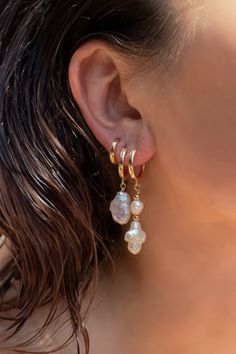 The pearl hoops everyone needs. Water resistant and guaranteed to turn heads! MaterialFreshwater pearls and 14k gold filled hoops and beads. Gold Filled Hoops, The Pearl, Freshwater Pearls, Ivy, Gold Filled, Water Resistant, Beads, Water, Gold