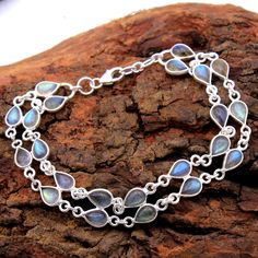 "925 Silver Bracelet, Women Bracelet, Gift For Her, Bridesmaid Gift, Gemstone Bracelet, Handmade Bracelet METAL - 925 STERLING SILVER GEMSTONE - Labradorite BRACELET SIZE - 7.5\" WEIGHT - 12.6 Grams STONE SIZE - 7x5 mm STONE SHAPE - Pear COLOR - Blue Silver: Silver has significant health benefits that have been used across cultures for centuries. Silver has a proven track record as a powerful antimicrobial agent fighting infections and aiding in cold and flu prevention, wound healing, and more. Silver also helps with internal heat regulation and circulation. Occasion:   Birthday gift, Valentine's Day Gift, Anniversary Gift, Wedding Gift, Engagement Gift, Christmas Gift, Gift For Her, Gift For mom, graduation gift, New Year Gift, Thanksgiving Gift, Housewarming Gift" Sterling Silver Bracelet With Gemstone And Moonstone, Silver Charm Bracelet With Natural Stones For Gift, Sterling Silver Natural Stones Bracelets For Anniversary, Sterling Silver Bracelets With Natural Stones For Anniversary, Silver Sterling Crystal Bracelet With Natural Stones, Sterling Silver Bracelets With Stones, Silver Sterling Silver Bracelet With Stones, Sterling Silver Crystal Bracelet With Natural Stones, Sterling Silver Stone Bracelets As Gift