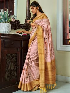 Elevate your traditional attire with the stunning "attractive pink floral printed silk function wear saree with blouse" from Ethnic Plus. This exquisite saree features a beautiful pink color with floral print work and intricate zari weaving work, adding a touch of elegance and charm to your look. Made from high-quality silk material, this saree drapes comfortably and gracefully, making it perfect for any special occasion.
This saree include its vibrant pink color, luxurious silk fabric, captivat Saree Drapes, Silk Printed Saree, Gota Patti Saree, Floral Print Sarees, Floral Saree, Simple Sarees, Casual Saree, Trendy Blouses, Printed Saree