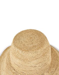 Perfect for keeping the UV rays away in style, Seventy's hat is the ideal accessory for the new season. It's crafted from raffia to a bucket silhouette that pairs perfectly with breezy dresses and beachy separates alike. Wear yours atop all of your favorite warm weather ensembles for a charming look you're sure to love. Summer Beach Sun Hat Made Of Natural Fiber, Natural Toquilla Straw Bucket Hat With Flat Brim, Beach Sun Hat Made Of Natural Fiber For Summer, Natural Color Beachy Hat For Travel, Natural Beachy Hat For Travel, Natural Color Beachy Travel Hat, Wide Brim Woven Bucket Hat In Natural, Wide Brim Jute Sun Hat For Vacation, Natural Woven Wide Brim Bucket Hat