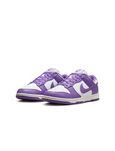 Brighten up your sneaker collection with the Nike Women's Dunk Low in White/Black Raspberry. This vibrant design features a crisp white base with bold black and raspberry accents, combining eye-catching style with the classic comfort of the Dunk Low. Purple Lace-up Sneakers For Light Sports, Nike Sneakers With White Contrast Sole, Nike Sporty Slip-on Sneakers With Rubber Sole, Sporty Purple Sneakers With Boost Midsole, Nike Sneakers With Contrast Sole For Streetwear, Nike Sporty Low-top Sneakers, Purple Sneakers With Rubber Sole For Streetwear, Sporty Purple High-top Sneakers For Streetwear, Purple Custom Sneakers For Light Sports