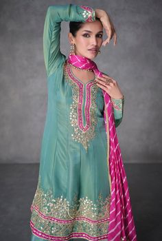 COLOR : Sea Green & Pink FABRIC : Top & Bottom - Organza Silk, Dupatta - Chinon Silk WORK : Silk Thread Embroidery, Gota Patti Work, Pearls, Foil Mirrors, Lace Border OCCASION : Wedding, Reception, Mehendi, Party Wear, Festival READY-TO-WEAR : No STITCHING : Available as semi-stitched fabric, can be stitched using standard size option (+$30). Note: There might be a slight color variation due to lighting and flash used during photoshoot. The bright shade seen is the best closer view of fabric's c Pista Green Slub Silk Anarkali Set With Dabka Work, Fitted Slub Silk Salwar Kameez With Cutdana, Transitional Pista Green Palazzo Set With Dabka Work, Pista Green Dola Silk Palazzo Set With Dabka Work, Embroidered Pista Green Slub Silk Salwar Kameez, Embroidered Slub Silk Anarkali Salwar Kameez, Anarkali Embroidered Slub Silk Salwar Kameez, Bollywood Style Semi-stitched Slub Silk Salwar Kameez, Semi-stitched Slub Silk Salwar Kameez Bollywood Style