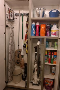 the closet is full of cleaning supplies and tools