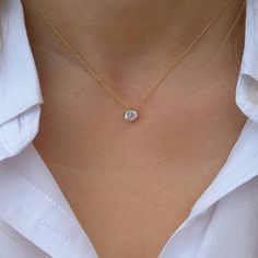 Solid Gold necklace made of a Cubic zirconia floating charm hanging on a high quality 14k or 9k gold chain. Appropriate for exceptional occasions. Fine anniversary gift. This 14k gold floating CZ necklace is the perfect gift for every woman. You can find the matching earrings at the below link: https://www.etsy.com/listing/1025694417 Length approx. 16 inches / 40,64 cm - can be adjusted upon request. The pendant is 6mm. Also available in 4mm. ♥ All items will be delivered in a nice gift envelope Oval Pendant Diamond Necklace As A Gift, Gift Diamond Necklace With Single Oval Pendant, Gift Oval Pendant Diamond Necklace With Single Diamond, Diamond White Oval Pendant Necklace For Gift, White Diamond Solitaire Necklace With Delicate Chain, Dainty Oval Diamond Necklace, Dainty Oval Diamond Solitaire Necklace, Dainty Diamond Necklace With Oval Pendant, Dainty Diamond Oval Pendant Necklace