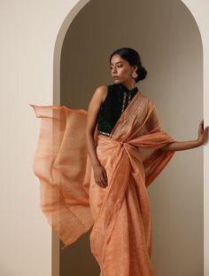 Embrace effortless sophistication with our Crush Tissue Sarees. Crafted to captivate, these sarees feature a delicately crinkled texture that exudes timeless elegance. Designed for graceful draping and enduring style, they effortlessly blend tradition with contemporary allure. Elevate your look with the enchanting charm of our Crush Tissue Sarees, a perfect fusion of artistry and grace Transitional Handloom Tissue Silk Pre-draped Saree, Fusion Style Silk Saree With Sheer Dupatta, Fusion Silk Saree With Sheer Dupatta, Designer Fusion Saree With Traditional Drape, Fusion Style Pre-draped Saree With Zari Work, Chanderi Fusion Pre-draped Saree With Dupatta, Fusion Style Pre-draped Chanderi Saree With Dupatta, Traditional Raw Silk Draped Saree, Elegant Handloom Pre-draped Saree