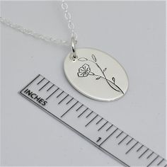 Birth Flower necklace with Morning Glory Design for September birth month. This hand-drawn design on sterling silver keepsake jewelry is simple enough for everyday wear. This custom necklace is a perfect gift for Grandma, Mom or Daughter on her Birthday, for Christmas or Mother's Day. *Charm: 13mm by 18mm *Chain Selection: 16-24 inch *Handcrafted from sheet metal with secure connections *Satin Finish .925 Sterling Silver, 14/20 Rose Gold Filled or 14/20 Yellow Gold Filled *Boxed in simple Kraft Delicate Sterling Silver Birth Flower Necklace, Sterling Silver Birth Flower Necklaces, Delicate Personalized Sterling Silver Flower Necklace, Delicate Sterling Silver Birth Flower Charm Necklaces, Delicate Sterling Silver Birth Flower Necklaces, Sterling Silver Birth Flower Necklace For Mother's Day, Sterling Silver Birth Flower Necklace For Mom, Sterling Silver Birth Flower Pendant Necklace, Sterling Silver Birth Flower Round Pendant Necklace