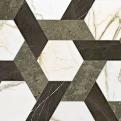 an abstract marble tile design with black and white hexagons