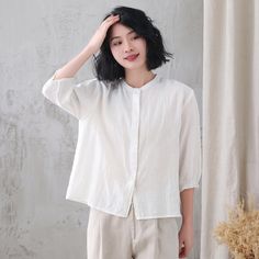 "Soft and comfy women linen blouse for summer, casual style blouse, loose fit size. Details: * linen shirt * rolled collar * 3/4 length sleeves * front button closure * loose and comfortable * causal women style * The model is 170cm (5′7″) tall with a 84cm (33\") bust, 66cm (26\") waist. She is wearing in size XS. Choose CUSTOM Order if you * Can't find your size in our size Chart * Your Height is not Between 5'1\" - 5\"9\" * Your weight is over 80kg SIZE GUIDE Size vary between Brand and Countr Relaxed Fit Plain Blouse, Plain Button-up Summer Blouse, Casual Linen Spring Blouse, Spring Relaxed Fit Ramie Shirt, Spring Relax Fit Ramie Shirt, Long Sleeve Ramie Blouse For Summer, Summer Long Sleeve Ramie Blouse, Summer Relaxed Fit Plain Blouse, Casual Long Sleeve Ramie Blouse