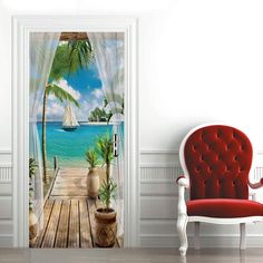 an open door leading to a tropical beach