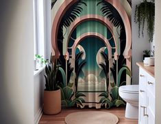 a bathroom with a shower curtain that has palm trees on it and an arch in the middle