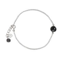 Delicate link chain bracelet in sterling silver with Faceted Black Onyx gemstone. The bracelet is 7 inches long plus 1 inch extension. The bracelet has a lobster lock clasp. The bracelet features a 8mm black onyx in the center and 5mm stone hanging in the end. Wear this bracelet on its own or layer it with our other bracelets. The bracelet comes packed in a box. Delivery: We try to ship the order the same working day if ordered before 12pm. We use Royal Mail 24, for U.K. , and, Royal Mail signed and tracked for International deliveries. Elegant Black Chain Bracelet With Silver Chain, Elegant Black Bracelet With Silver Chain, Elegant Black Bracelets With Silver Chain, Black Sterling Silver Chain Bracelet, Black Charm Bracelet With Lobster Clasp, Classic Black Bracelet With Silver Chain, Classic Black Bracelets With Silver Chain, Polished Black Bracelets, Elegant Black Chain Bracelets