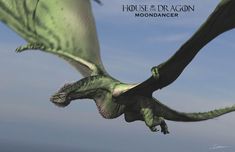 a large green dragon flying through the air