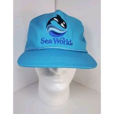 This Vintage Sportcap Trucker Hat Is A Must-Have For Any Shamu Fan Or Collector Of Animal-Themed Memorabilia. The Blue Hat Features An Adjustable Snapback Closure And Is Made Of Comfortable Cotton Material, Making It Perfect For Summer Or Spring Wear. The Hat's Solid Pattern And Travel/Casual Occasion Make It A Versatile Addition To Any Wardrobe. The Hat's Aspects Include A Shamoo Character, Marine Life, Aquariums, And The Ocean, As Well As A 90s Theme And Speedway Brand. It Is Not Handmade And Disney Hats, Vintage Sea, 90s Theme, Pabst Blue Ribbon, Top Golf, Wide Brim Fedora, Nfl Logo, Brown Hats, Spring Wear