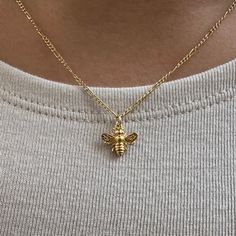 Honey Bee Necklace The honey bee symbolizes dedication, community and work ethic -  associated with the both hard work and the sweetness of life, the honey been is a reminder to stay in balance. - Gold Vermeil Honey Bee Charm - 14k Gold-filled 1.4mm Figaro Chain  - Length: 16, 18, 20 inches  - Hypoallergenic, water resistant, non-tarnish خواتم خطوبة, Preppy Jewelry, Bee Necklace, Work Ethic, Bee Charms, Pretty Jewelry, Classy Jewelry, Jewelry Lookbook, Layering Necklace