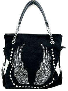 This listing is for (1) Wings Design Rhinestone Handbag Add a touch of edge to your outfit with this black faux leather crossbody bag from TnT Biker Apparel. Featuring wing design, studded accents, buckles, and rhinestones, this bag is perfect for travel, party, casual, and formal occasions. The bag has a zipper closure and adjustable strap with a drop of 12 to 23 inches. With a size of 13L x 12.5H x 4.5W inches, the bag has enough space for your essentials. The interior is lined with linen and has pockets with zipper closure. The chrome hardware adds to the bag's durability and style. Make a statement with this unique and versatile bag that complements any outfit.  The zippers and the hardware  are very strong and durable.  (SIZE 13L x 12.5H x 4.5W) (1) REAR ZIPPER POCKET  6" x 5" (1) INS Embellished Tote Shoulder Bag For Everyday Use, Fashion Accessory Shoulder Bag With Silver-tone Hardware, Shoulder Bag With Silver-tone Hardware For Fashion Accessory, Silver-tone Hardware Shoulder Bag, Embellished Rectangular Shoulder Bag For Everyday Use, Everyday Embellished Rectangular Shoulder Bag, Chic Rhinestone Bags For Shopping, Embellished Top Handle Shoulder Bag For Shopping, Rectangular Shoulder Bag With Rhinestone Rivets For Everyday Use