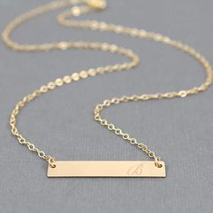 Customized 14K Gold Filled Name Plate Necklace. Perfect Everyday Necklace and Great for Layering with other Necklace! -- D E T A I L S -- 1. Rectangular 14K Gold Filled Bar: 5.2 X 31mm 2. 14K Gold-Filled Flat Cable Chain * All components are made in the USA. -- HOW TO ORDER -- STEP 1: Please select the necklace length you like in the 2nd drop-down menu STEP 2: Please leave us a note in the message box with personalization details at checkout. ✤ Names or words to be stamped on your necklace - 14K Elegant Personalized Gold-plated Necklaces, Personalized Yellow Gold Brass Necklaces, Customizable Gold Bar Necklace For Personalized Gift, Personalized Minimalist 14k Gold-filled Necklace, Gold Bar Necklace With Rectangular Pendant For Personalized Gift, Saturn Necklace, Personalized Name Plates, Engraved Bar Necklace, Plate Necklace