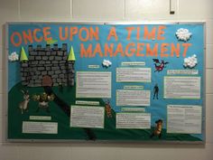 a bulletin board on the wall with information about time management and other things to do