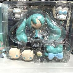 an action figure is displayed in a plastic box with other figures around it on display