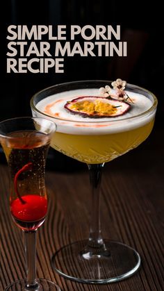 two glasses filled with drinks sitting on top of a wooden table next to each other