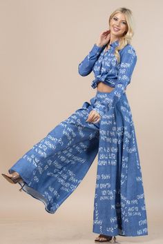 Denim Look Milano Graffiti Print Wide Leg Palazzo Pants Zipper Inseam 31" Pocket detail skirt pants. Made in USA. Fabric: 95% Polyester, 5% Spandex Color can look different depending of the light washable Model Wears Small sizes runs regular. Model wear S. Model: 5'8" 34-23-36. Please see the size chart for information on the fit Casual Beach Wear, Wide Leg Palazzo Pants, Design Dresses, Graffiti Prints, African Design Dresses, African Design, Palazzo Pants, Shop Swimwear, New Arrival Dress