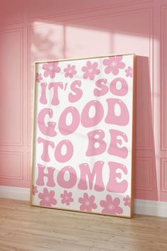 it's so good to be home sign in front of pink wall