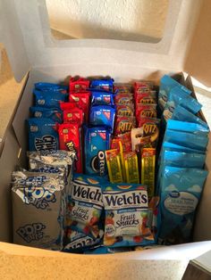 a box filled with lots of different types of snacks