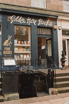 a store front with stairs leading up to it