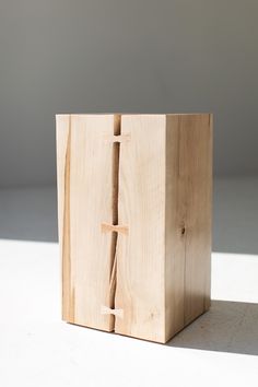 a wooden block with a cross on it