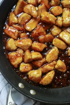 some food is cooking in a pan on the stove