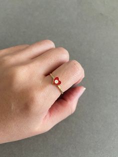 14K Solid Gold/ Heart Evil Eye Ring, Red Blue- 14K Solid Gold Quantity : One Ring Color : Gold Material : 14K Solid Gold Ring Size : 7  Band Size : about 1.4mm wide and 1mm thick Heart Evil Eye Size : 6.8mm * Metal components are 14K Solid Gold. * Suitable for delicate and sensitive skin. * Comes in a jewelry box. If you need extra boxes for gifting....just let us know! Dainty Red Rings For Valentine's Day, Valentine's Day Red Heart Ring, Red Heart Ring With Birthstone For Valentine's Day, Red Heart Birthstone Ring For Valentine's Day, Red Heart Ring In 14k Gold, Red Heart Birthstone Ring In 14k Gold, 14k Gold Heart Cut Red Heart Ring, 14k Gold Red Heart Cut Ring, Red 14k Gold Heart Ring With Birthstone