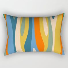 a rectangular pillow with an abstract design on the front and back cover in blue, green, yellow, orange, and white