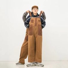 Size Chart:1. Pls allow 1-3cm tolerance due to manual measure.2. Color may slightly vary from the image due to different computer screen and light affect.3.If you are not sure about the size, Pls let us know your weight,height, Bust,Waist info etc, We can help to choose correct size. Brown Baggy Utility Pants, Baggy Brown Utility Pants, Brown Utility Overalls For Fall, Brown Workwear Overalls With Pockets, Vintage Brown Cotton Overalls, Brown Utility Pants For Winter, Brown Cotton Overalls With Pockets, Casual Brown Overalls, Brown Cotton Overalls