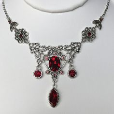 Red Gothic Metal Necklace, Red Gothic Necklace For Formal Occasions, Red Intricate Design Necklace For Party, Red Necklace With Intricate Design For Party, Party Red Necklace With Intricate Design, Red Metal Filigree Jewelry, Antique Red Necklace For Wedding, Formal Red Necklaces With Intricate Design, Ornate Red Wedding Necklaces