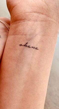 100 Ohana Tattoos Tiny Family Tattoo Ideas, Ohana Tattoo Wrist, Tattoos For Your Parents Ideas, Tattoo Ideas Family Unique, Unique Family Tattoo Designs, Ohana Finger Tattoo, Tattoo Ideas Meaning Family, Tattoos Family Meaningful