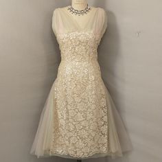 Gorgeous And Unusual, High Quality Vintage Dress. Pale Blush Pink With Cream. Estimated Fifties/Sixties. Overall Good Condition, With One Panel Of Pink Netting Missing (See Pic). For Sizing Please Go By Measurements, Shown On An 8 ( Nice Fit, Some Room) And A 6 Dress Form (Loose). Length Is 48", Bust 38", Waist 30", Hips 40". Label Is Fredleys, . . .Boston, Providence, Wellesley. Unique Find. Feminine, Romantic, Ethereal. Well Worth The Small Repair Or Very Wearable As Is. Spring Wedding Evening Dress With Lace Patchwork, Ethereal Tulle Evening Dress For Party, Delicate Fitted Dress With Sheer Bodice, Sheer Mesh Wedding Dress, Elegant Tulle Lace Dress For Garden Party, Ethereal Sleeveless Party Dress, Delicate Fitted Evening Dress, Garden Party Tulle Dress With Lace Patchwork, Spring Wedding Evening Dress With Lace Trim