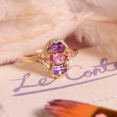 Artist's Statement Inspired by Monet’s Misty Morning on the Seine (1897), this piece radiates elegance and charm. It captures the soft, delicate hues of mauve, nestled within irregularly whipped brushstrokes that enhance its timeless magnificence. Pink And Gold Ring, Pink Amethyst Gemstone Ring, 14k Gold Purple Amethyst Ring, Mystical Amethyst Gemstone Rings, Elegant 14k Gold Amethyst Ring Collectible, Pink 14k Gold Amethyst Ring, Pink And Purple Sky, Dope Jewelry Accessories, Minimalist Accessories